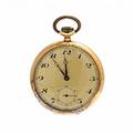 Lommeur af 14 kt. guld, gylden skive med arabertal og små sekunder, støvkapsel af metal. Ca. 1930-1940. Vægt ialt 77 gr. Kassediam. 49 mm.