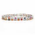 Safirarmbånd af forgyldt sølv prydet med talrige facetslebne multicolor safirer. L. ca. 16 cm. Æske medfølger. 2011.