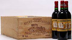 12 bts. Château Ducru-Beaucaillou, Saint - Julien.2. Cru Classé 1983 A hfin. Owc.