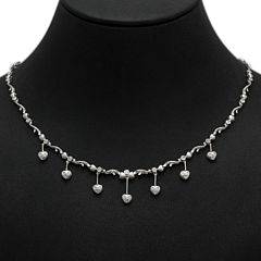 Diamanthalskæde af 18 kt. hvidguld prydet med talrige brillantslebne diamanter på i alt ca. 0.56 ct. L. ca. 42 cm. Certifikat medfølger. 2000-10.