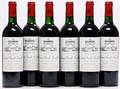 6 bts. Château Léoville Las Cases, Saint - Julien. 2. Cru Classé 1986 A-AB bn.