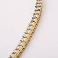 Diamantarmbånd af 18 kt. guld prydet med talrige brillantslebne diamanter på i alt ca. 2.30 ct. Wesselton H. Klarhed VS-SI. Certifikat og æske medfølger. 2005