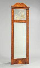 Empire spejl i ramme af mahogni med indlægninger af lyst træ, dekoreret med kvinde i klassiske klæder. 19. årh.s begyndelse. H. 177.