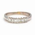 Diamantring af 18 kt. hvidguld prydet med talrige baguetteslebne diamanter. Str. 54,5. 1980-90.