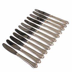 Saksisk blomst. Et sæt på 8 samt et sæt på 4 middagsknive med skafter af sølv. Udført hos Cohr. L. 22,8 og 21,7. 12