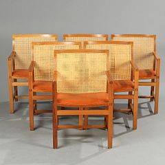 Rud Thygesen, Johnny Sørensen Kongeserien. Seks armstole af mahogni med fransk rørflet i ryg, sæder med rødbrunt skind. Udført hos Botium. 6