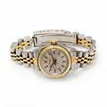 Rolex Damearmbåndsur af guld og stål. Model Oyster Perpetual. Automatisk værk. Ca. 1977.