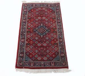 Handknuten matta, orientalisk