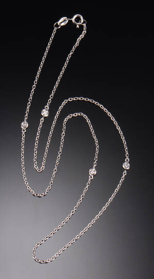 Halskæde udført i 18 kt. hvidguld prydet med brillanter samlet ca. 0.20 ct   Denne vare er sat til omsalg under nyt varenummer 5042246