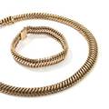 Armbånd og halskæde af 14 kt. guld. Vægt 99 gr. L. 17,5 og 40. Ca. 1950-60erne. 2