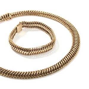 Armbånd og halskæde af 14 kt. guld. Vægt 99 gr. L. 17,5 og 40. Ca. 1950-60erne. 2