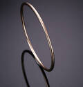 A. Dragsted. Glat armring af 14 kt. guld