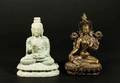 Buddha figure i sten respektive metall av senare datum2