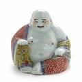 Budai af porcelæn. 20. årh. H. 26 cm.