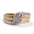 Diamantring af 14 kt. guld og hvidguld prydet med talrige brillantslebne diamanter på i alt ca. 0,24 ct. Vægt ca 9,5 gr. Str. 57.