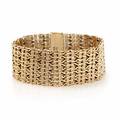 Armbånd af 14 kt. guld. L. ca. 19x2,5 cm. Vægt ca. 69 gr.
