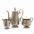 Kaffeservice af sølv. P. Hertz, København 1889. Vægt 772 gr. H. 11,5-24 cm. 3