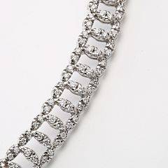 Diamanthalskæde af 18 kt. hvidguld prydet med talrige brillantslebne diamanter på i alt ca. 5.00 ct. Top WesseltonVVS-VS. Rom, ca. 1990.