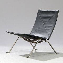 Poul Kjærholm PK-22. Hvilestol med stel af stål, sæde og ryg af sort skind. Udført og mærket hos Fritz Hansen, 2006.