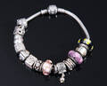 Pandora. Armbånd med charms. 11