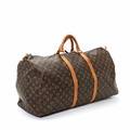 Louis Vuitton Keepall 60 i monogram canvas med hank lynlås, brunt foer og ét stort rum. H. ca. 32 cm. L. ca. 60,5 cm. B. ca. 26 cm.