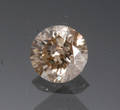 Uindfattet champagnefarvet diamant, ca. 0.80 ct.