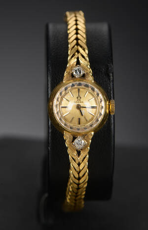 Omega damearmbåndsur af guld