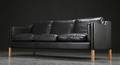 Stouby. Tre-pers. sofa, sort læder 
