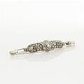 Brosch 18 k vitguld diamanter