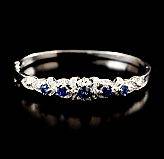 Armring 18 k vitguld safirer och diamanter