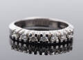 Alliancering med 7 brillanter, ca. 0.21 ct. 14 kt. hvidguld