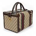 Gucci, beautybox i brunt monogrammönster