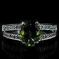 Ring 14 k vitguld peridot diamanter