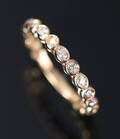 Alliancering af 14 kt guld med brillanter ca. 0.50 ct
