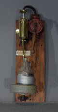 Petroleums stander monteret på plade, 1900-tallet