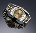 Rolex Oyster Perpetual. Vintage dameur i 18 kt. guld og stål, 1960erne