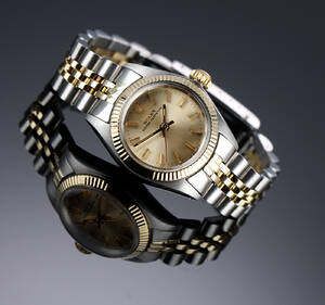 Rolex Oyster Perpetual. Vintage dameur i 18 kt. guld og stål, 1960erne