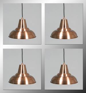 Et sæt på fire pendler af kobber lakeret metal, model Station. 4