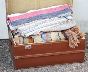 Koffert innehållande trasmattor