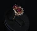 Ring i 18k guld med diamanter ca 0.30 ct och rubiner