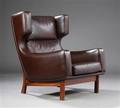 Dansk møbelproducent. Lænestol, læder, palisander