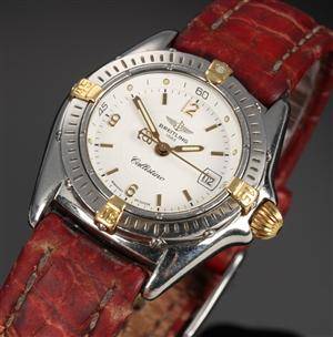 Breitling Callistino. Dameur i 18 kt. guld og stål med original rem og spænde