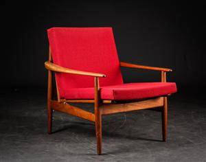 Dansk møbelproducent. Lænestol af teak