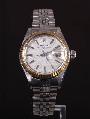 Rolex Oyster Perpetual Date. Damearmbåndsur, 18 kt. guldstål