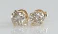 Par brillantørestikker, ca. 0.95 ct. 2