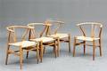 Hans J. Wegner. Et sæt på fire Y-stole af egetræ, model CH-24. 4 