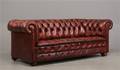 Chesterfield sofa med rødbrunt læder