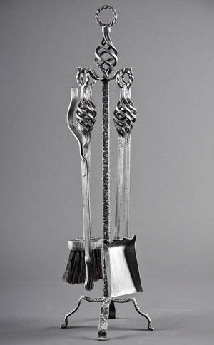 Pejsesæt af smedejern