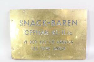 Skylt i mässing