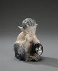 Royal Copenhagen. Figur af porcelæn i form af faun nr. 1412